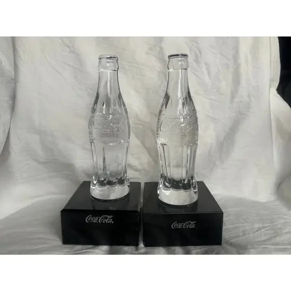Set of 2 Coca-Cola Collectors Christmas‎ Bottles Hobbleskirt solid & stands 6 oz
